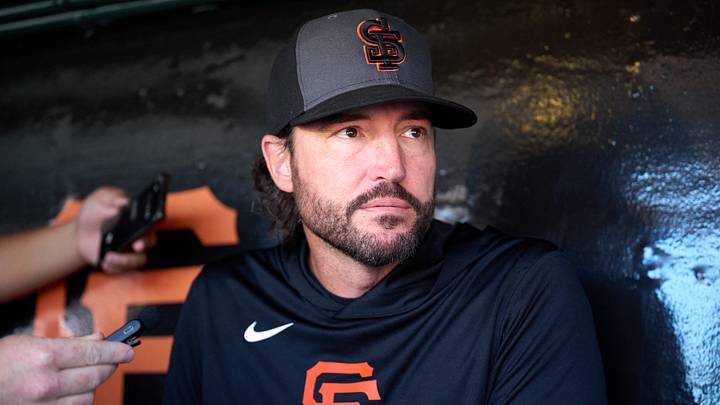 San Francisco, California, USA; San Francisco Giants manager Tony Vitello (23) speaks to the media in the dugout before a game against the Atlanta Braves at Oracle Park. Mandatory Credit: Robert Edwards-Imagn Images San Francisco, California, USA; San Francisco Giants manager Tony Vitello (23) speaks to the media in the dugout before a game against the Atlanta Braves at Oracle Park. Mandatory Credit: Robert Edwards-Imagn Images
