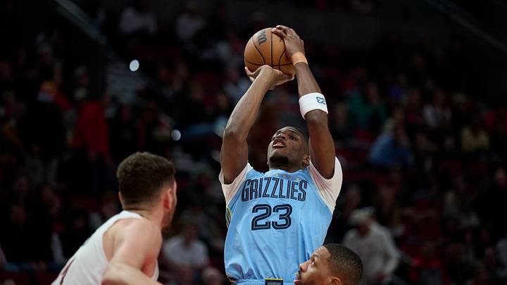 Oct 29, 2026; Portland, Oregon, USA; Memphis Grizzlies forward Cedric Coward (23) shoots a jump shot during the second half against Portland Trail Blazers guard Damian Lillard (0) and center Donovan Clingan (23) at Moda Center. Mandatory Credit: Troy Wayrynen-Imagn Images