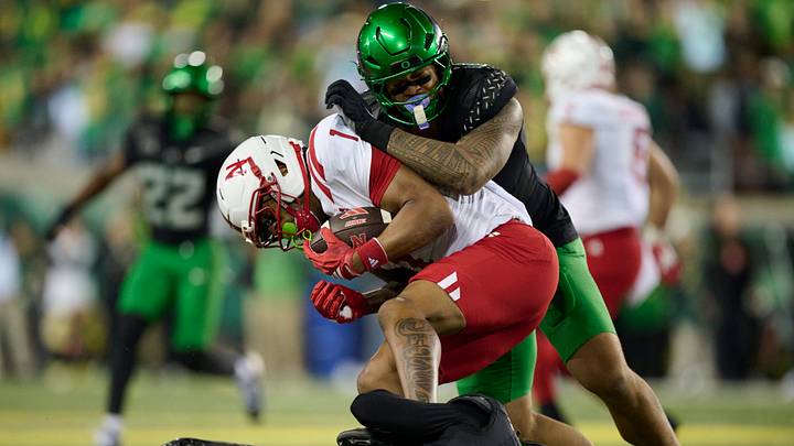 Oct 17, 2026; Eugene, Oregon, USA; Nebraska Cornhuskers wide receiver Nyziah Hunter (1) is tackled by Oregon Ducks linebacker Matayo Uiagalelei (10) and defensive back Davon Benjamin (5) during the first half at Autzen Stadium. Oct 17, 2026; Eugene, Oregon, USA; Nebraska Cornhuskers wide receiver Nyziah Hunter (1) is tackled by Oregon Ducks linebacker Matayo Uiagalelei (10) and defensive back Davon Benjamin (5) during the first half at Autzen Stadium.