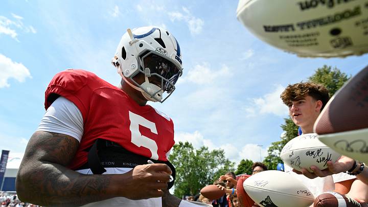 Aug 11, 2026; Foxborough, MA, USA; Indianapolis Colts quarterback Anthony Richardson Sr. (5) signs an autograph for a fan after practice during training camp at Gillette Stadium. Mandatory Credit: Eric Canha-Imagn Images Aug 11, 2026; Foxborough, MA, USA; Indianapolis Colts quarterback Anthony Richardson Sr. (5) signs an autograph for a fan after practice during training camp at Gillette Stadium. Mandatory Credit: Eric Canha-Imagn Images