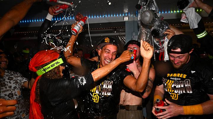 Sep 24, 2026; Los Angeles, California, USA; San Diego Padres owners Jose E. Feliciano and Kwanza Jones celebrate with the team after securing a playoff spot at Dodger Stadium. Mandatory Credit: William Liang-Imagn Images Sep 24, 2026; Los Angeles, California, USA; San Diego Padres owners Jose E. Feliciano and Kwanza Jones celebrate with the team after securing a playoff spot at Dodger Stadium. Mandatory Credit: William Liang-Imagn Images