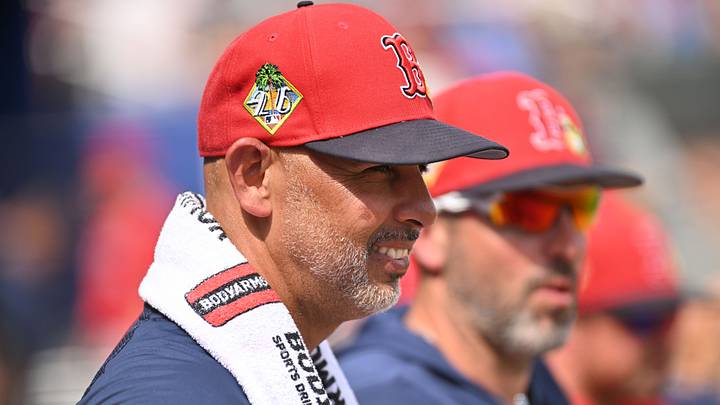 Feb 27, 2026; North Port, Florida, USA; Boston Red Sox manager Alex Cora (13) looks on in the first inning against the Atlanta Braves during spring training at CoolToday Park. Mandatory Credit: Jonathan Dyer-Imagn Images