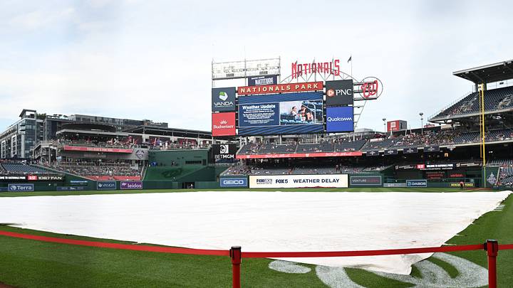 Jun 12, 2026; Washington, District of Columbia, USA; The rain tarp covers the infield at Nationals Park before a game between the Washington Nationals and the Seattle Mariners. Mandatory Credit: Rafael Suanes-Imagn Images Jun 12, 2026; Washington, District of Columbia, USA; The rain tarp covers the infield at Nationals Park before a game between the Washington Nationals and the Seattle Mariners. Mandatory Credit: Rafael Suanes-Imagn Images