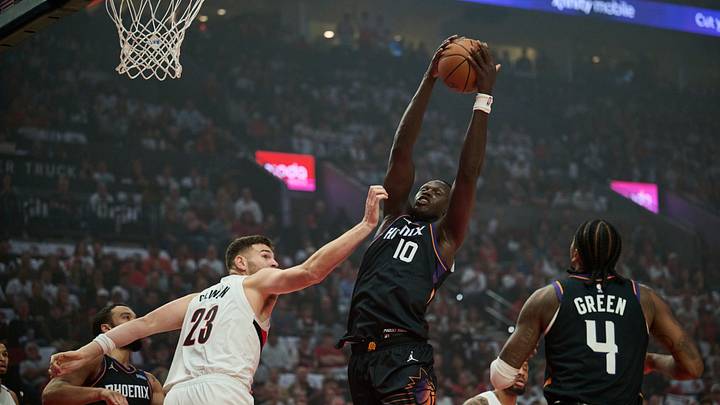 Oct 21, 2026; Portland, Oregon, USA; Phoenix Suns center Khaman Maluach (10) grabs a rebound during the first half against Portland Trail Blazers center Donovan Clingan (23) at Moda Center. Mandatory Credit: Troy Wayrynen-Imagn Images Oct 21, 2026; Portland, Oregon, USA; Phoenix Suns center Khaman Maluach (10) grabs a rebound during the first half against Portland Trail Blazers center Donovan Clingan (23) at Moda Center. Mandatory Credit: Troy Wayrynen-Imagn Images