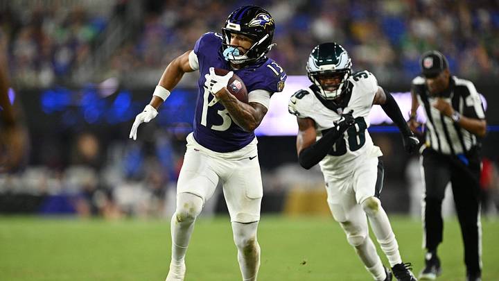 Aug 15, 2026; Baltimore, Maryland, USA;  Baltimore Ravens wide receiver Elijah Sarratt (13) tip toes along the sideline after catching a pass in the second half against the Philadelphia Eagles at M&T Bank Stadium. Mandatory Credit: Jamie Sabau-Imagn Images