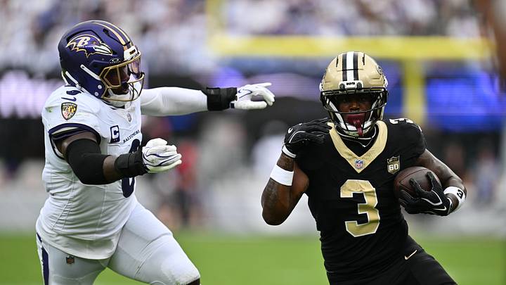 Sep 20, 2026; Baltimore, Maryland, USA; New Orleans Saints running back Travis Etienne Jr. (3) runs with the ball while defended byBaltimore Ravens linebacker Roquan Smith (0) in the second half at M&T Bank Stadium. Mandatory Credit: Jamie Sabau-Imagn Images Sep 20, 2026; Baltimore, Maryland, USA; New Orleans Saints running back Travis Etienne Jr. (3) runs with the ball while defended byBaltimore Ravens linebacker Roquan Smith (0) in the second half at M&T Bank Stadium. Mandatory Credit: Jamie Sabau-Imagn Images