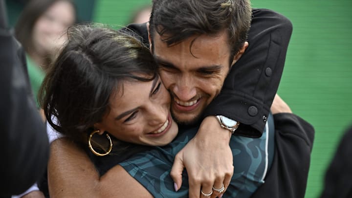 Lorenzo Musetti hugs his girlfriend, Veronica Confalonieri, at the Monte Carlo Masters 2025.