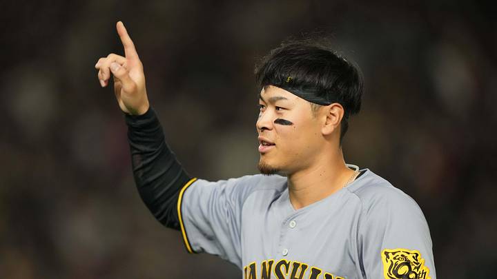 Mar 15, 2025; Bunkyo, Tokyo, Japan; Hanshin Tigers right fielder Teruaki Sato (8) gestures during the fifth inning against the Chicago Cubs at Tokyo Dome. Mandatory Credit: Darren Yamashita-Imagn Images Mar 15, 2025; Bunkyo, Tokyo, Japan; Hanshin Tigers right fielder Teruaki Sato (8) gestures during the fifth inning against the Chicago Cubs at Tokyo Dome. Mandatory Credit: Darren Yamashita-Imagn Images