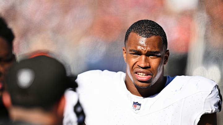 Oct 22, 2023; Chicago, Illinois, USA;  Las Vegas Raiders defensive end Tyree Wilson (9) takes a breather on the sidelines against the Chicago Bears at Soldier Field. Mandatory Credit: Jamie Sabau-Imagn Images
