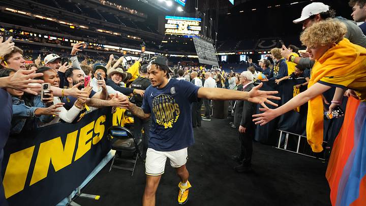 Apr 6, 2026; Indianapolis, IN, USA; Michigan Wolverines guard Roddy Gayle Jr. (11) with fans after the National Championship of the Final Four of the men's 2026 NCAA Tournament at Lucas Oil Stadium. Mandatory Credit: Bob Donnan-Imagn Images