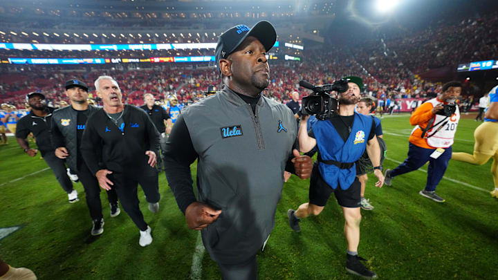 Nov 29, 2025; Los Angeles, California, USA; UCLA Bruins interim coach Tim Skipper leaves the field after the game against the Southern California Trojans at United Airlines Field at Los Angeles Memorial Coliseum. Mandatory Credit: Kirby Lee-Imagn Images