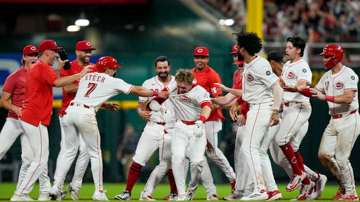 Cincinnati Reds pinch hitter Gavin Lux (2) hits a walk-off RBI line drive to score Elly De La Cruz from third base in the bottom of the 11th inning of the MLB interleague game between the Cincinnati Reds and the New York Yankees at Great American Ball Park in downtown Cincinnati on Tuesday, June 24, 2025. The Reds won 5-4 in 11 innings.