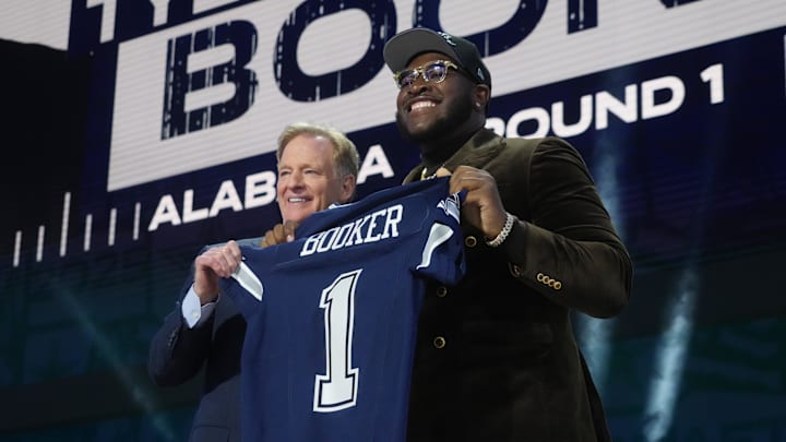 Apr 24, 2025; Green Bay, WI, USA; NFL commissioner Roger Goodell with Alabama Crimson Tide offensive lineman Tyler Booker after he is selected by the Dallas Cowboys as the number twelve pick in the first round of the 2025 NFL Draft at Lambeau Field. Mandatory Credit: Kirby Lee-Imagn Images