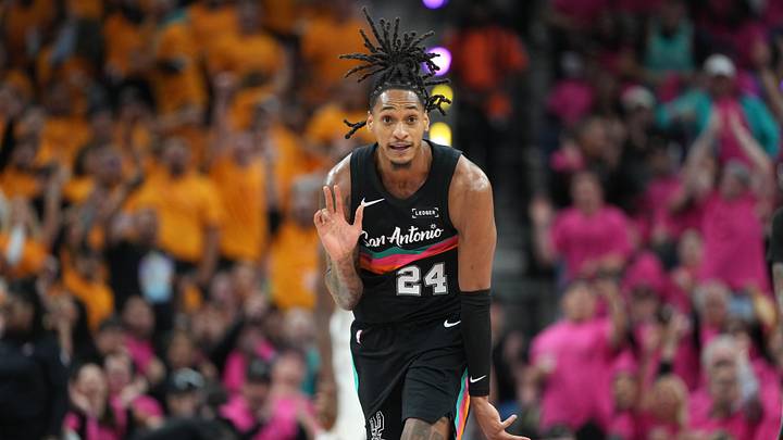 Apr 19, 2026; San Antonio, Texas, USA; San Antonio Spurs guard Devin Vassell (24) reacts after scoring a three-point basket during the second half of game one of the first round of the 2026 NBA Playoffs against the Portland Trail Blazers at Frost Bank Center. Mandatory Credit: Scott Wachter-Imagn Images