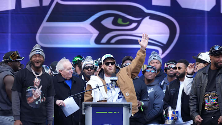 Feb 11, 2026; Seattle, WA, USA; Seattle Seahawks wide receiver Cooper Kupp speaks during the Super Bowl LX trophy celebration at Lumen Field. Mandatory Credit: Kirby Lee-Imagn Images