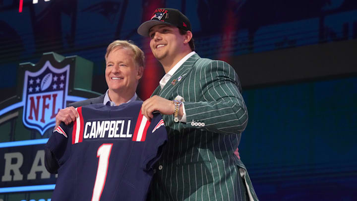 Apr 24, 2025; Green Bay, WI, USA; NFL commissioner Roger Goodell with LSU Tigers offensive lineman Will Campbell after he is selected by the New England Patriots as the number four pick in the first round of the 2025 NFL Draft at Lambeau Field. Mandatory Credit: Kirby Lee-Imagn Images Apr 24, 2025; Green Bay, WI, USA; NFL commissioner Roger Goodell with LSU Tigers offensive lineman Will Campbell after he is selected by the New England Patriots as the number four pick in the first round of the 2025 NFL Draft at Lambeau Field. Mandatory Credit: Kirby Lee-Imagn Images