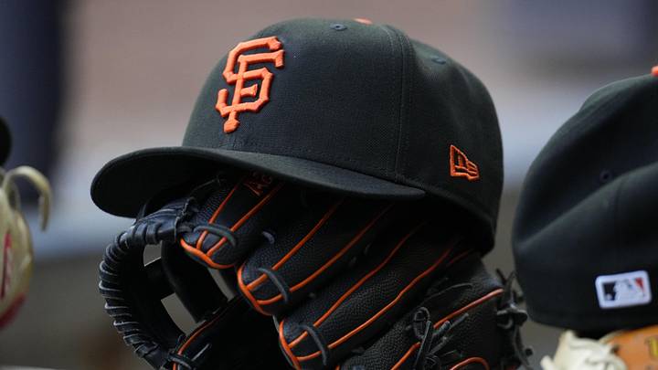 Jun 1, 2026; Milwaukee, Wisconsin, USA; San Francisco Giants hat and glove on the ledge of the dugout against the Milwaukee Brewers in the first inning at American Family Field. Mandatory Credit: Michael McLoone-Imagn Images