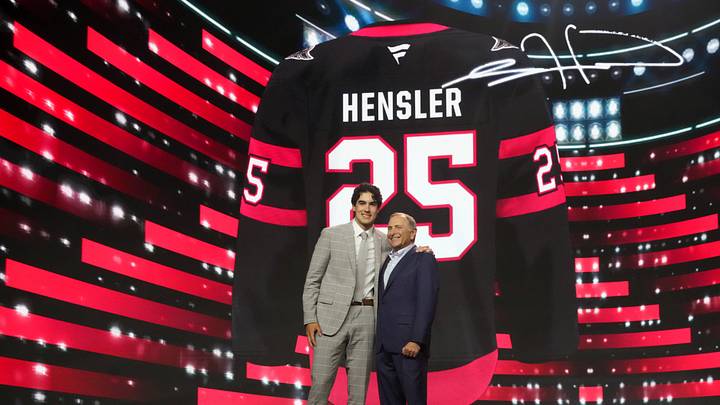 Jun 27, 2025; Los Angeles, California, USA; Logan Hensler is selected as the 23rd overall pick to the Ottawa Senators in the first round of the 2025 NHL Draft at Peacock Theater. Mandatory Credit: Kirby Lee-Imagn Images