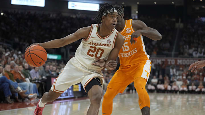 Jan 11, 2025; Austin, Texas, USA; Texas Longhorns guard Tre Johnson (20) drives to the basket against Tennessee Volunteers guard Jahmai Mashack (15) during the first half  at Moody Center. Mandatory Credit: Scott Wachter-Imagn Images