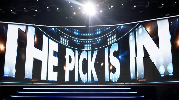 Jun 27, 2025; Los Angeles, California, USA; The video board shows the 20th overall pick for the Columbus Blue Jackets is about to be announced in the first round of the 2025 NHL Draft at Peacock Theater. 