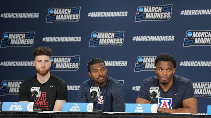 Mar 19, 2026; San Diego, CA, USA; Arizona Wildcats guard Anthony Dell'orso (left),  guard Jaden Bradley (center) and forward Tobe Awaka during a press conference ahead of the first round of the men's 2026 NCAA Tournament at Viejas Arena. Mandatory Credit: Kirby Lee-Imagn Images