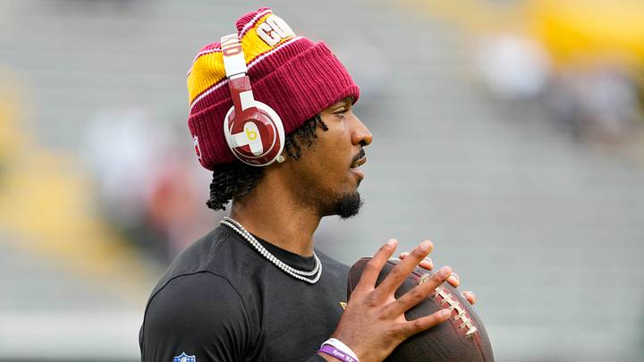 Washington Commanders quarterback Jayden Daniels (5) during warmups prior to the game against the Green Bay Packers at Lambeau Field. Washington Commanders quarterback Jayden Daniels (5) during warmups prior to the game against the Green Bay Packers at Lambeau Field.