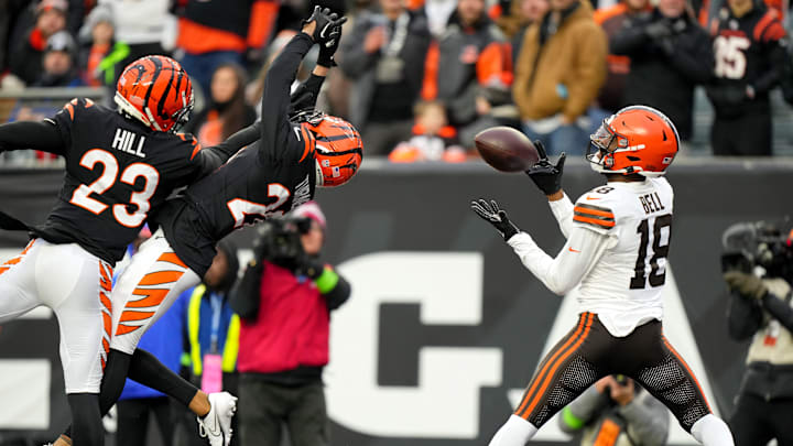 Cleveland Browns wide receiver David Bell (18) catches a touchdown pass as Cincinnati Bengals cornerback DJ Turner II (20) defends in the fourth quarter during a Week 18 NFL football game between the Cleveland Browns at Cincinnati Bengals, Sunday, Jan. 7, 2024, at Paycor Stadium in Cincinnati.