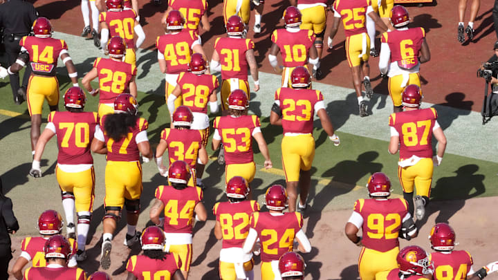 Aug 30, 2025; Los Angeles, California, USA; A general overall view as Southern California Trojans players enter the field before the game against the Missouri State Bears at the United Airlines Field at Los Angeles Memorial Coliseum. Mandatory Credit: Kirby Lee-Imagn Images