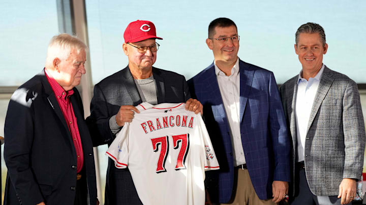 New Cincinnat Reds manager Terry Francona holds his new jersey on stage with (left to right) team owner Bob Castellini, President of Baseball Operation, Nick Krall, and General Manager Brad Meador, during an event to introduce the new manager of the Cincinnati Reds at Great American Ball Park in downtown Cincinnati on Monday, Oct. 7, 2024.