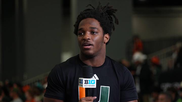 Jan 17, 2026; Miami, Florida, USA; Miami Hurricanes receiver Malachi Toney on the Big Ten Network stage during media day for the 2025 College Football Playoff National Championship at Miami Beach Convention Center. Mandatory Credit: Kirby Lee-Imagn Images Jan 17, 2026; Miami, Florida, USA; Miami Hurricanes receiver Malachi Toney on the Big Ten Network stage during media day for the 2025 College Football Playoff National Championship at Miami Beach Convention Center. Mandatory Credit: Kirby Lee-Imagn Images