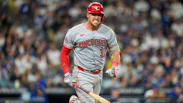 Cincinnati Reds catcher Tyler Stephenson (37) grits his teeth after hitting in a sacrifice fly, scoring Austin Hayes in the eighth inning of the MLB National League Wild Card Game 2 between the Los Angeles Dodgers and the Cincinnati Reds at Dodger Stadium in Los Angeles on Wednesday, Oct. 1, 2025. The Reds were eliminated from the postseason with an 8-4 loss to the reining World Series Champions La Dodgers.
