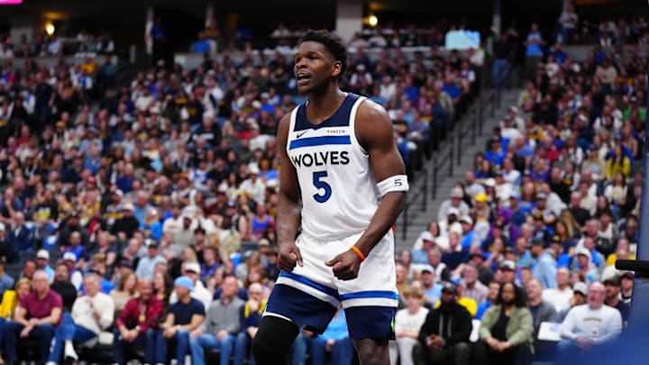 Apr 20, 2026; Denver, Colorado, USA; Minnesota Timberwolves guard Anthony Edwards (5) reacts in the first half against the Denver Nuggets during game two of the first round of the 2026 NBA Playoffs at Ball Arena. Mandatory Credit: Ron Chenoy-Imagn Images