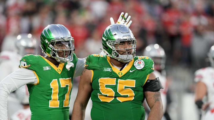 Jan 1, 2025; Pasadena, CA, USA; Oregon Ducks defensive lineman Derrick Harmon (55) reacts in the second half against the Ohio State Buckeyes in the 2025 Rose Bowl college football quarterfinal game at Rose Bowl Stadium. Mandatory Credit: Kirby Lee-Imagn Images Jan 1, 2025; Pasadena, CA, USA; Oregon Ducks defensive lineman Derrick Harmon (55) reacts in the second half against the Ohio State Buckeyes in the 2025 Rose Bowl college football quarterfinal game at Rose Bowl Stadium. Mandatory Credit: Kirby Lee-Imagn Images