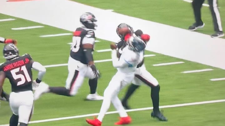 Azeez Al-Shaair wasn't called for a penalty on this ugly hit on Titans QB Cam Ward. 