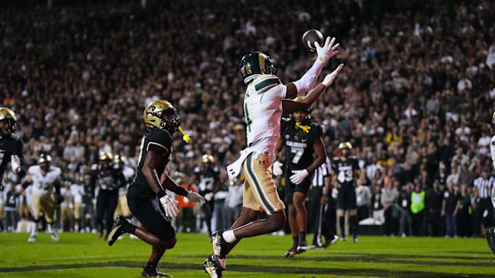 Sep 16, 2023; Boulder, Colorado, USA; Colorado State Rams wide receiver Tory Horton (14) pulls in a touchdown in overtime loss to the Colorado Buffaloes at Folsom Field. Mandatory Credit: Ron Chenoy-Imagn Images