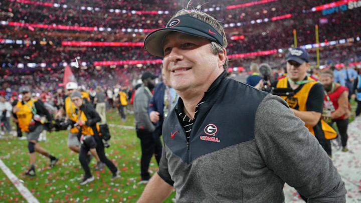 Jan 9, 2023; Inglewood, CA, USA; Georgia Bulldogs head coach Kirby Smart runs off the field after winning the CFP national championship game against the TCU Horned Frogs at SoFi Stadium. Mandatory Credit: Kirby Lee-Imagn Images
