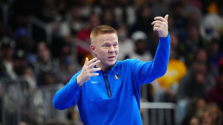 Nov 3, 2023; Denver, Colorado, USA; Dallas Mavericks assistant coach Sean Sweeney calls out in the second half against the Denver Nuggets at Ball Arena. Mandatory Credit: Ron Chenoy-USA TODAY Sports