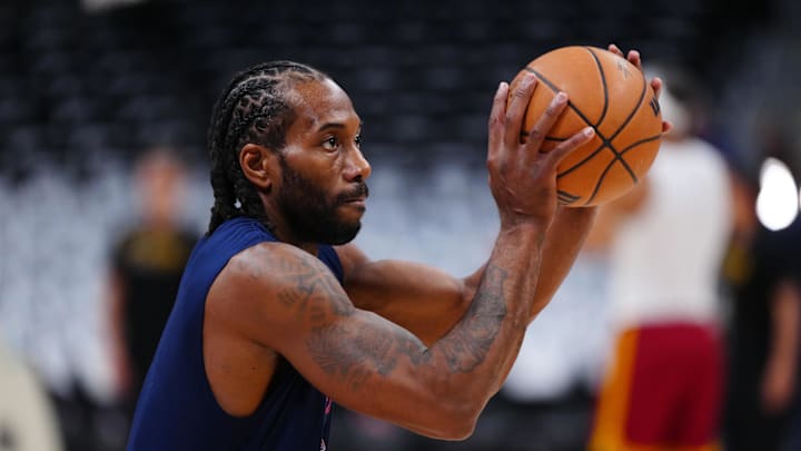 Apr 29, 2025; Denver, Colorado, USA; LA Clippers forward Kawhi Leonard (2) warms up before game five of the first round for the 2025 NBA Playoffs against the Denver Nuggets at Ball Arena. Mandatory Credit: Ron Chenoy-Imagn Images