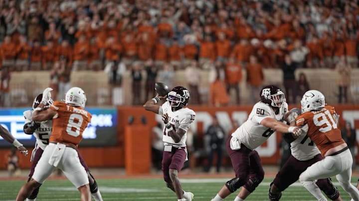 Nov 28, 2025; Austin, Texas, USA; Texas A&M Aggies quarterback Marcel Reed (10) throws a pass during the first half against the Texas Longhorns at Darrell K Royal-Texas Memorial Stadium. Mandatory Credit: Scott Wachter-Imagn Images