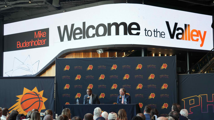 May 17, 2024; Phoenix, AZ, USA; Mike Budenholzer speaks alongside General Manager James Jones during a press conference to announce his job as head coach of the Phoenix Suns. May 17, 2024; Phoenix, AZ, USA; Mike Budenholzer speaks alongside General Manager James Jones during a press conference to announce his job as head coach of the Phoenix Suns.