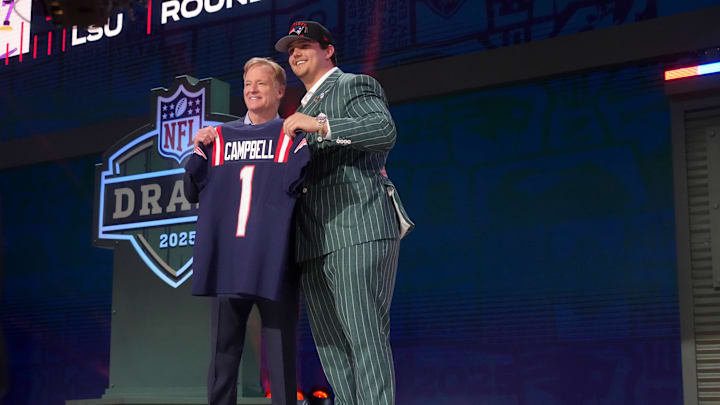 Apr 24, 2025; Green Bay, WI, USA; NFL commissioner Roger Goodell with LSU Tigers offensive lineman Will Campbell after he is selected by the New England Patriots as the number four pick in the first round of the 2025 NFL Draft at Lambeau Field. Mandatory Credit: Kirby Lee-Imagn Images