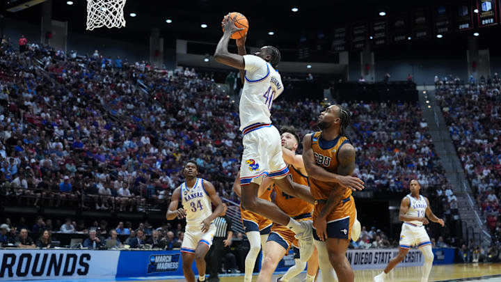 Mar 20, 2026; San Diego, CA, USA; Kansas Jayhawks forward Flory Bidunga (40) shoots against California Baptist Lancers guard Martel Williams (33) in the first half during a first round game of the men's 2026 NCAA Tournament at Viejas Arena. Mandatory Credit: Kirby Lee-Imagn Images