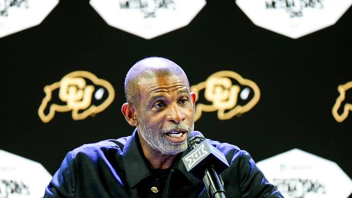 Jul 7, 2026; Frisco, TX, USA;  Colorado head coach Deion Sanders speaks to reporters during Big 12 Conference Football Media Days at The Star. Mandatory Credit: Raymond Carlin III-Imagn Images