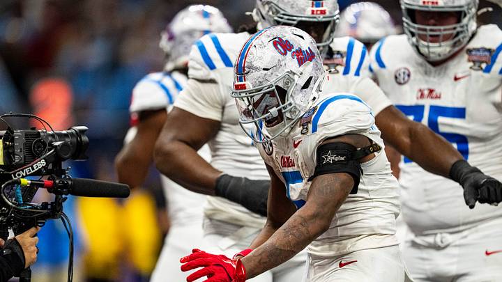 Ole Miss running back Kewan Lacy (5) celebrates with a camera during the Sugar Bowl and College Football Playoff quarterfinals at Caesars Superdome in New Orleans, La., on Thursday, Jan. 1, 2026. Ole Miss defeated Georgia 39-34. Ole Miss running back Kewan Lacy (5) celebrates with a camera during the Sugar Bowl and College Football Playoff quarterfinals at Caesars Superdome in New Orleans, La., on Thursday, Jan. 1, 2026. Ole Miss defeated Georgia 39-34.