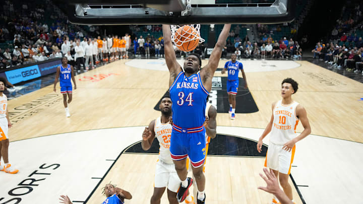 Nov 26, 2025; Las Vegas, NV, USA; Kansas Jayhawks center Paul Mbiya (34) guards the rebound in the second half against the Tennessee Volunteers in the 2025 Players Era Festival third place game at MGM Grand Garden Arena. Mandatory Credit: Kirby Lee-Imagn Images