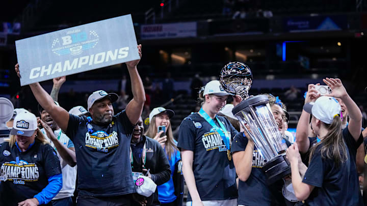 UCLA Bruins celebrates Sunday, March 8, 2026, after the Big Ten Tournament Championship game at Gainbridge Fieldhouse in Indianapolis. UCLA Bruins defeated the Iowa Hawkeyes, 96-45, for back to back Big Ten championships. UCLA Bruins celebrates Sunday, March 8, 2026, after the Big Ten Tournament Championship game at Gainbridge Fieldhouse in Indianapolis. UCLA Bruins defeated the Iowa Hawkeyes, 96-45, for back to back Big Ten championships.