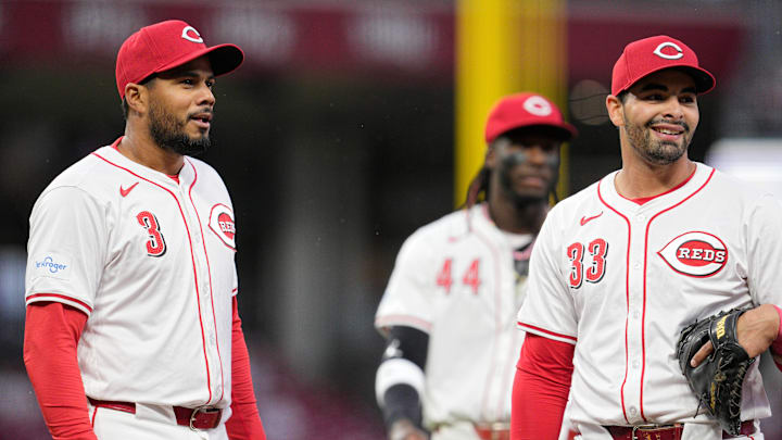 Cincinnati Reds infielders Jeimer Candelario, Elly De La Cruz, Christian Encarnacion-Strand