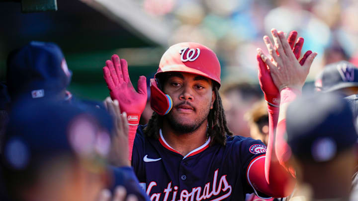 James Wood celebrates in the dugout after his second homer of Spring Training.
