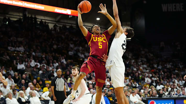 Feb 23, 2023; Boulder, Colorado, USA; USC Trojans guard Boogie Ellis (5) shoots the ball over