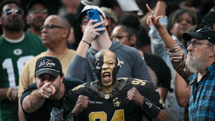 New Orleans Saints fans show their pride during the first half of a game
